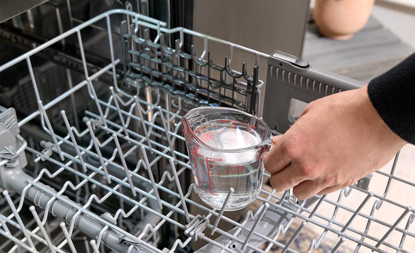 clean dishwasher with vinegar baking soda